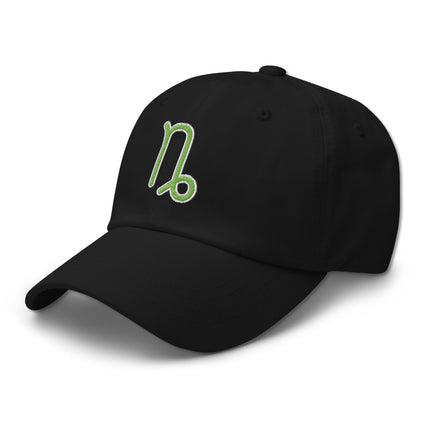 Green baseball cap with embroidered Capricorn zodiac symbol.