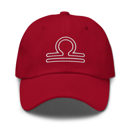 Embroidered Libra zodiac cap featuring the astrology scales symbol outline.