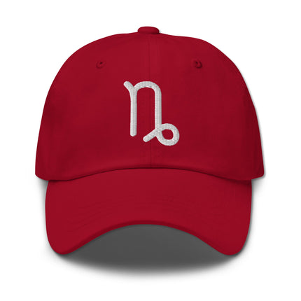 Embroidered Capricorn zodiac sign baseball cap featuring the astrology symbol dad hat.