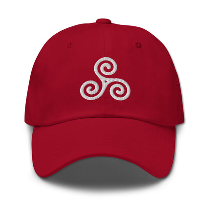 Embroidered Celtic triskele dad hat featuring a detailed spiral symbol.