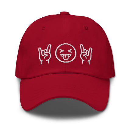 Embroidered rock emoji dad hat featuring hand gesture and playful tongue out face design.