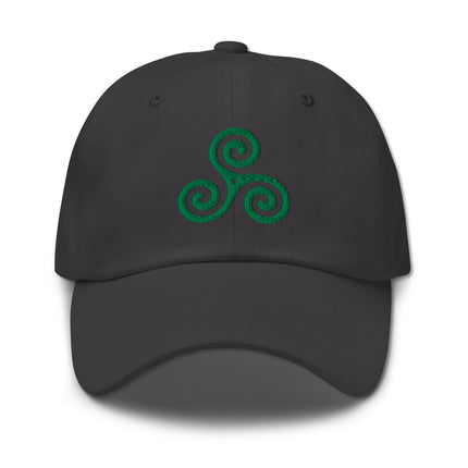 Green baseball cap featuring embroidered Celtic Triskelion symbol design.