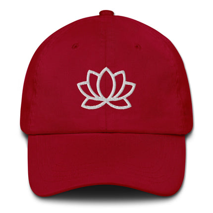 Cotton dad hat featuring embroidered lotus flower design on unstructured cotton fabric.