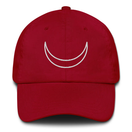 Embroidered crescent moon celestial symbol on a casual baseball cap.