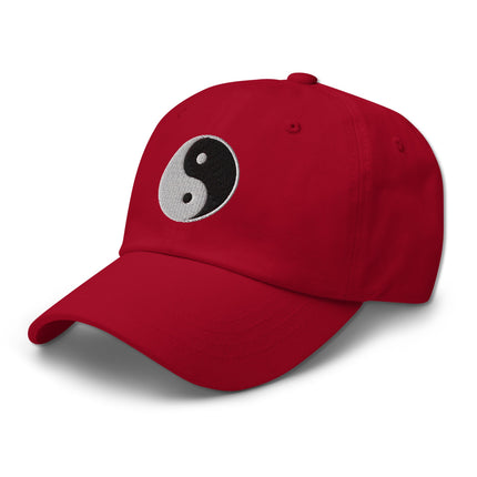 Dad hat with embroidered yin yang symbol graphic design.