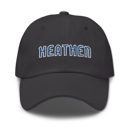 Blue and white embroidered dad hat featuring "Heathen" text design on an unstructured cap.