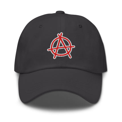 Red embroidered baseball cap featuring the Anarchy symbol 'A' in a circle.