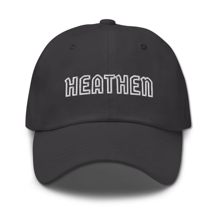 Embroidered "Heathen" text dad hat on unstructured cotton baseball cap.