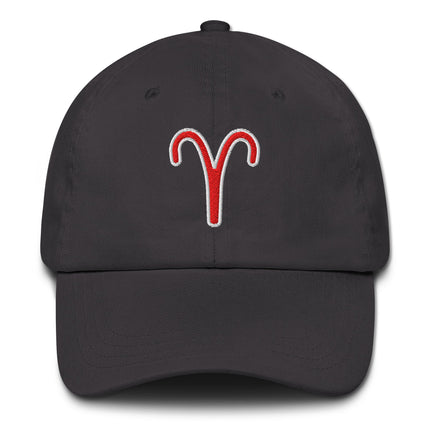 Red embroidered Aries zodiac sign on a black baseball cap.