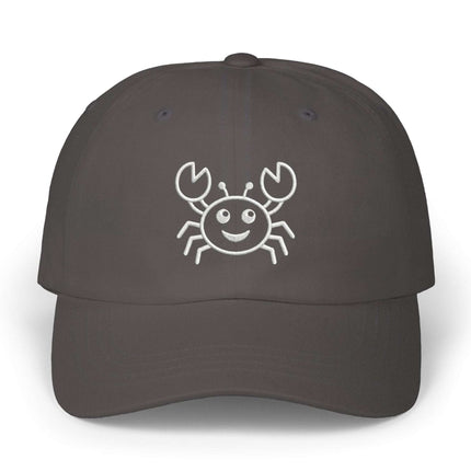 Dark gray baseball cap featuring a white embroidered cartoon crab design for ocean lovers.