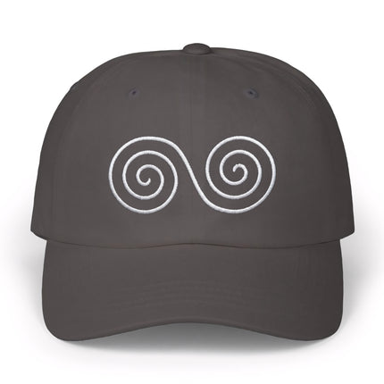 Gray baseball cap featuring embroidered double spiral Celtic knot design.