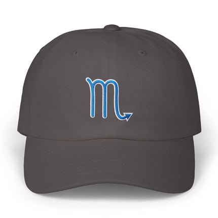 Blue embroidered Scorpio zodiac sign on a dark gray baseball cap.