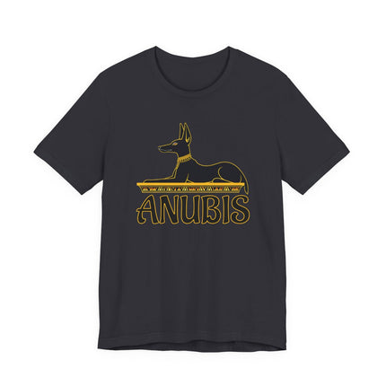 Anubis Egyptian god graphic on a black tee, featuring a gold silhouette design of the jackal-headed deity.