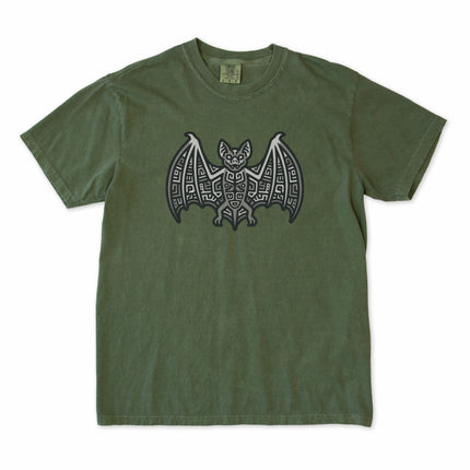 Geometric Mayan bat symbol t-shirt featuring tribal geometric patterns in blue and indigo.
