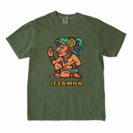 Colorful Itzamná Mayan god graphic t-shirt design featuring ancient Mesoamerican mythology artwork.