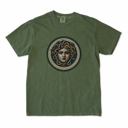 Blue t-shirt graphic featuring a mosaic depiction of the Medusa Gorgon head from Greek mythology.