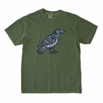 Indigenous raven symbol t-shirt featuring stylized Pacific Northwest tribal art design.