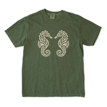 Ornate tribal seahorse and marine life design printed on a unisex t-shirt.