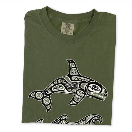 Haida formline art killer whale orca design printed on a t-shirt with waves.