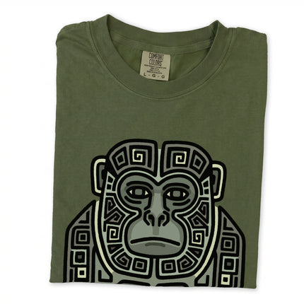 Blue green tribal art t-shirt featuring a stylized Mayan monkey graphic design.