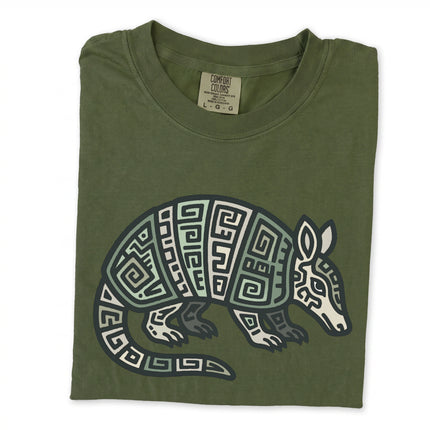 Geometric Mayan tribal armadillo graphic tee in blue and green tones.