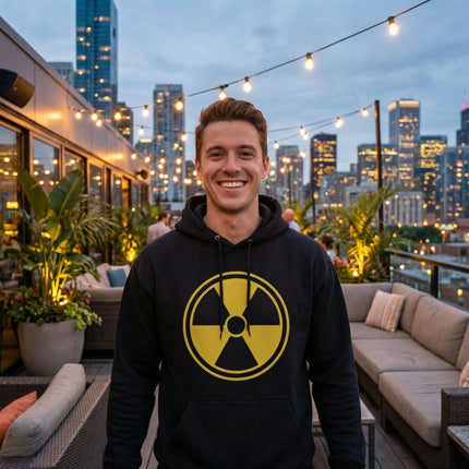 Black graphic hoodie featuring a bold yellow radioactive symbol design.