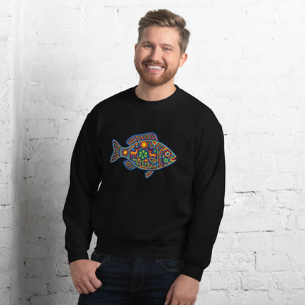 Vibrant Huichol fish art print on a cozy pullover sweatshirt featuring colorful Mexican folk design.