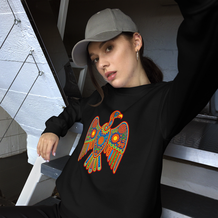 Colorful Huichol vulture artwork on a pullover featuring vibrant Mexican indigenous folk designs.