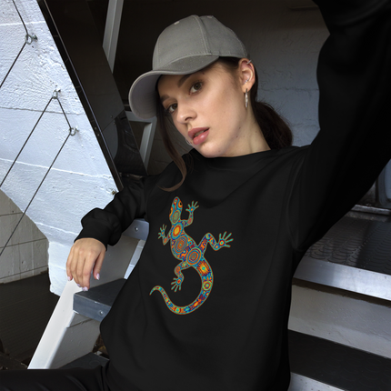 Colorful Huichol tribal lizard artwork printed on a unisex pullover sweatshirt.