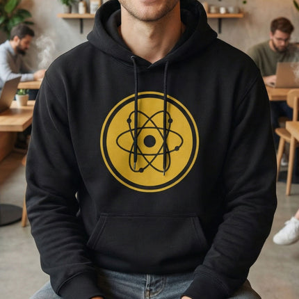 Yellow atomic symbol graphic on a black science hoodie, featuring the electron model.