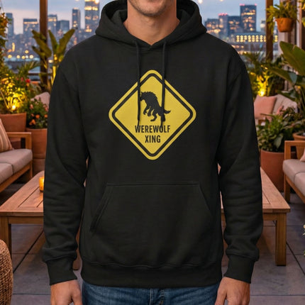 Black hoodie featuring a yellow warning sign graphic with a werewolf silhouette and "WEREWOLF XING" text.