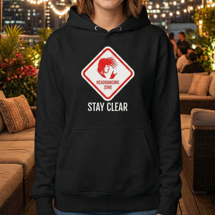 Headbanging Zone Stay Clear graphic on a black rock music hoodie for metalhead fans.