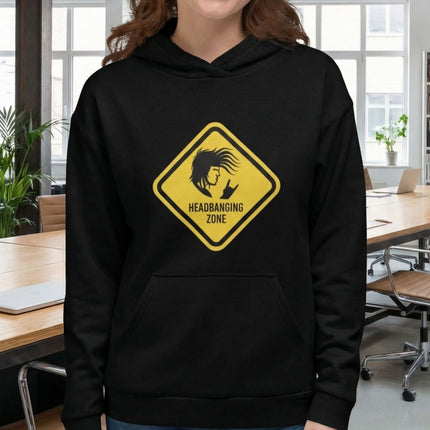 Yellow warning sign graphic with headbanging silhouette and "HEADBANGING ZONE" text on black hoodie.
