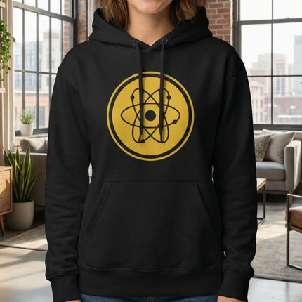 Yellow atomic symbol graphic on a black hoodie for science and physics enthusiasts.