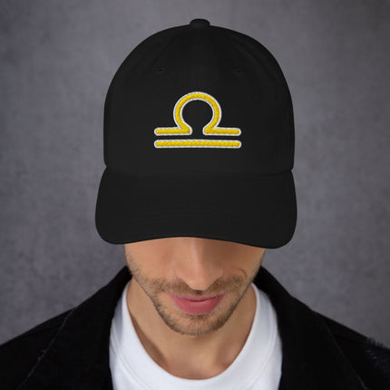 Yellow embroidered Libra zodiac symbol baseball cap for astrology lovers.