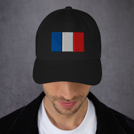 Black baseball cap featuring embroidered French tricolor flag design.
