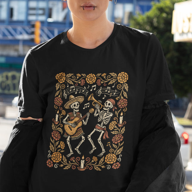 Dancing skeletons and flowers graphic for Mexican Día de Muertos t-shirt design.