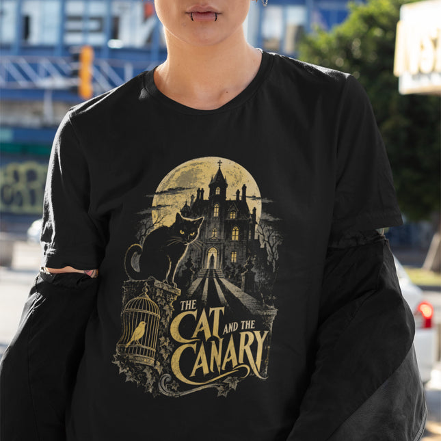 Gothic moonlit mansion artwork tee featuring The Cat and the Canary spooky scene.