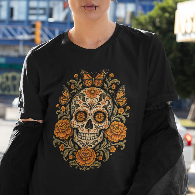 Calavera skull and butterfly art t-shirt featuring vibrant orange flowers.