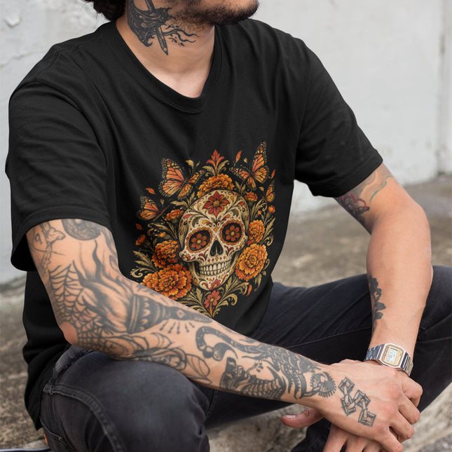 Calavera skull art tee with marigolds, butterflies, and floral designs.