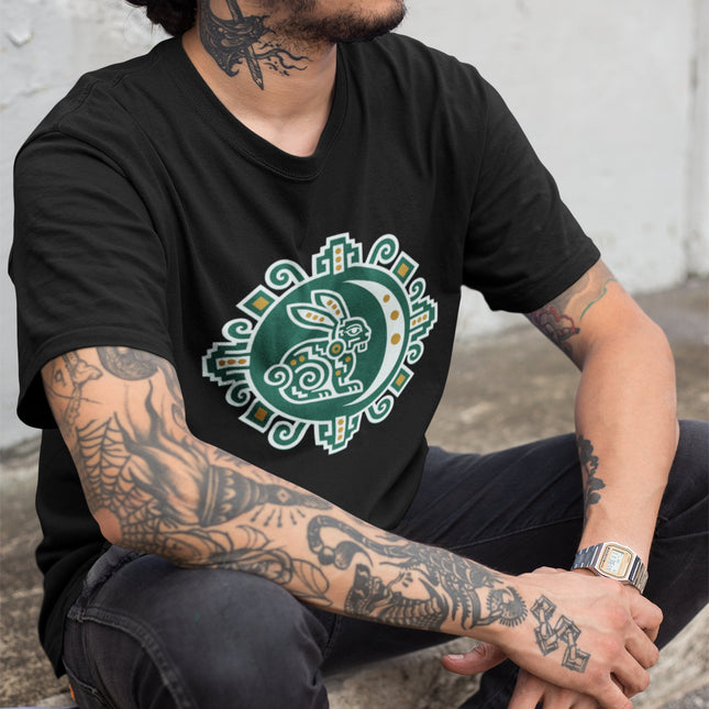 Green tee with Mayan celestial rabbit and moon graphic design.