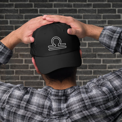 Libra zodiac embroidered cap featuring the scales symbol outline for astrology lovers.