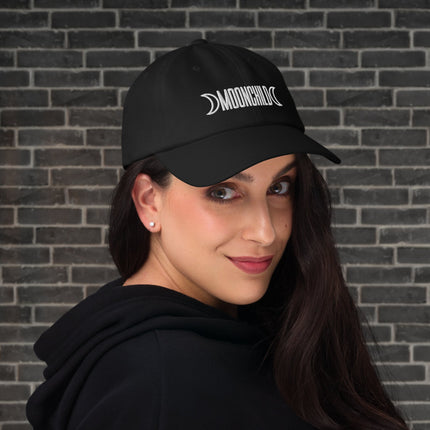 Embroidered black baseball cap featuring a delicate crescent moon symbol design.