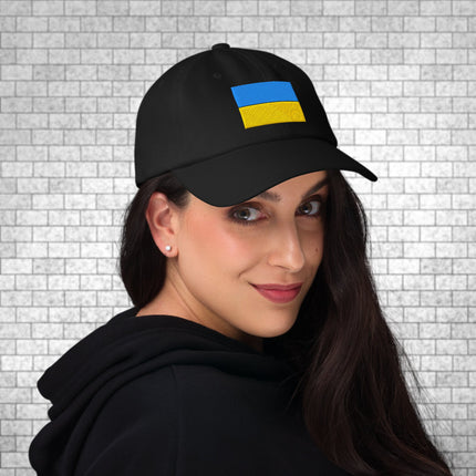 Black baseball cap featuring embroidered blue and yellow Ukrainian flag design.