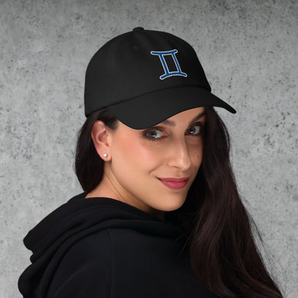 Blue embroidered Gemini zodiac symbol baseball cap.