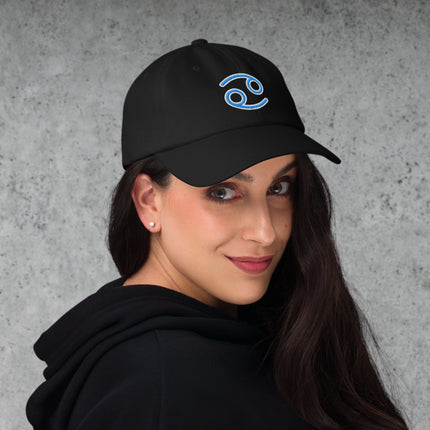 Blue embroidered dad hat featuring the Cancer zodiac sign and astrology design.