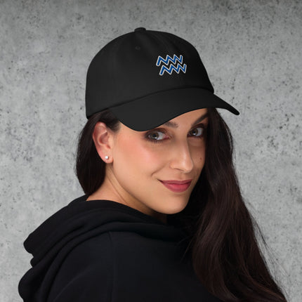 Blue embroidered dad cap featuring the Aquarius zodiac constellation symbol.