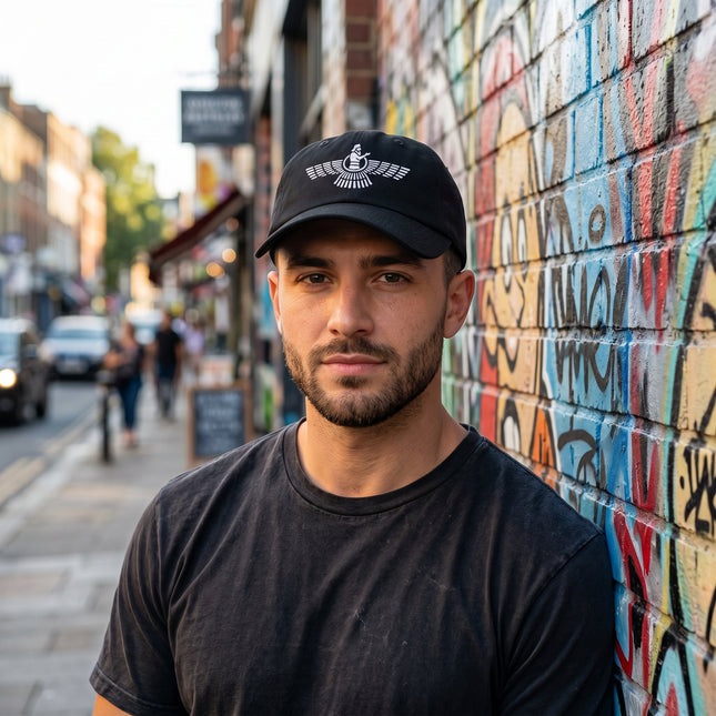 Black baseball cap featuring the embroidered Faravahar symbol, representing Zoroastrian and Persian culture.