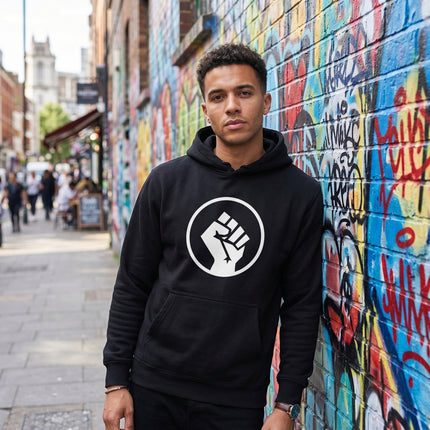 Black hoodie featuring a white raised fist graphic, symbolizing solidarity and protest.