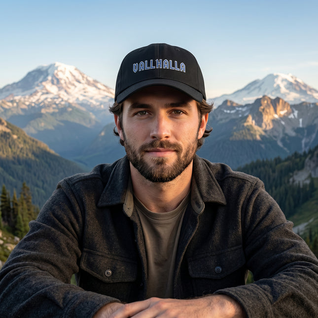 Black embroidered Valhalla baseball cap with blue Norse mythology text.